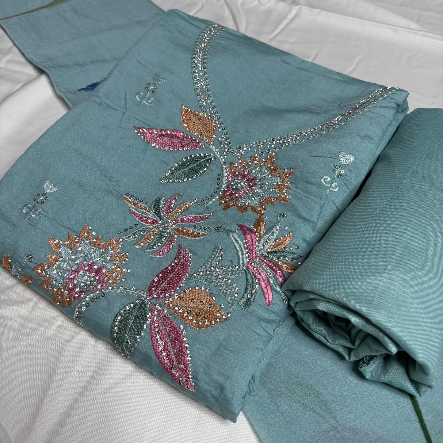 Aqua Blue Embroidered Suit – Brush Print Dupatta – Rayon Bottom