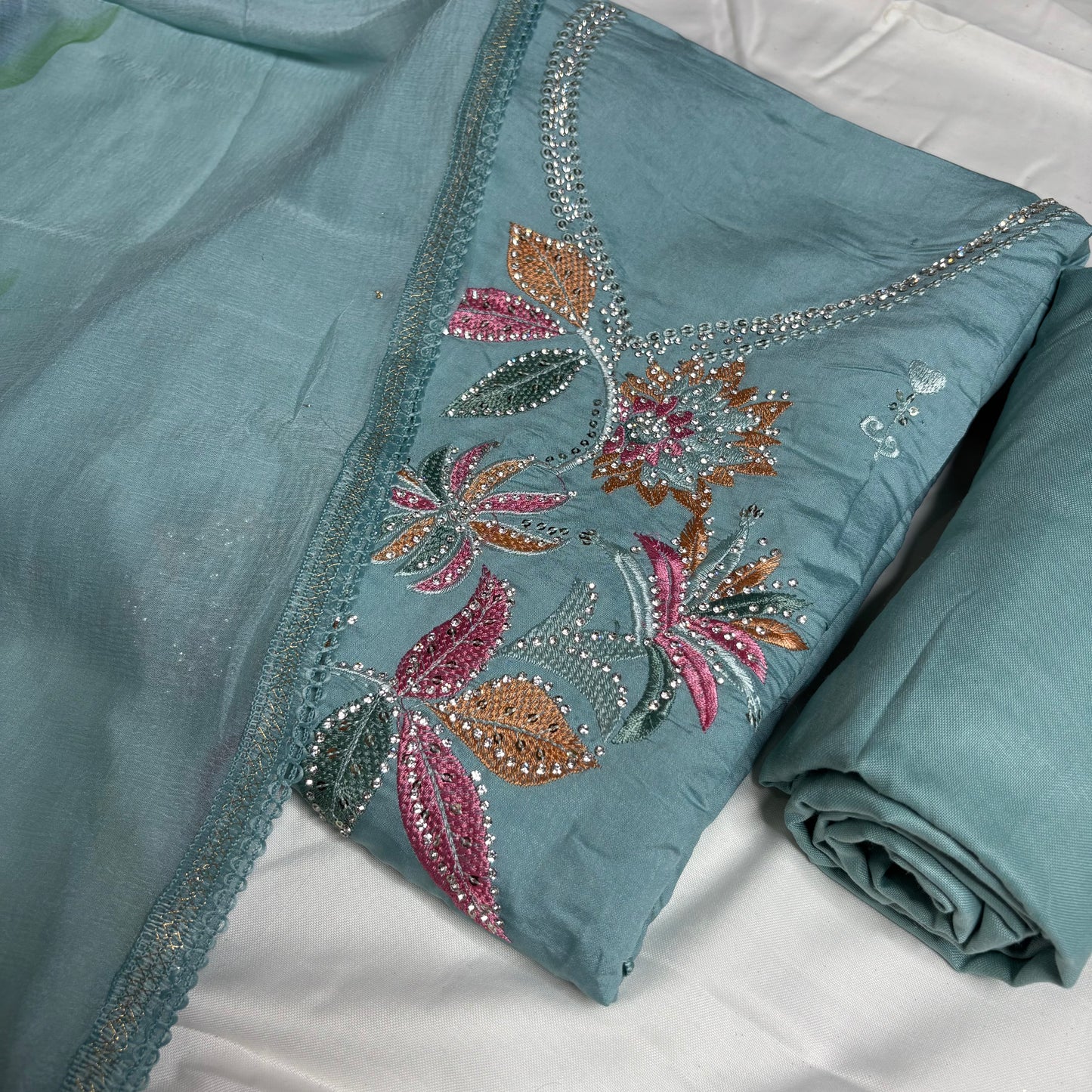 Aqua Blue Embroidered Suit – Brush Print Dupatta – Rayon Bottom
